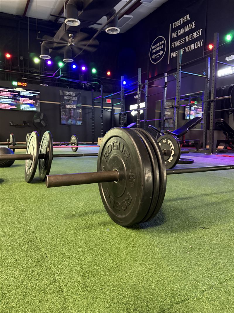 Barbell loaded on the gym floor